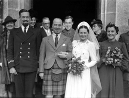 Hamish Paterson (1904-1982), Chartered Architect based at 17 Queensgate, Inverness, married Florence Margaret Ross (1909-1987) in 1940. (see also 24194a and 24194b). Hamish had a twin brother called Hector Paterson (see image ref: 37284). Bridesmaid is bride's sister Joyce Ross. At far left is groom's mother, Jenny Paterson. Hamish was the son of famous photographer Andrew Paterson (1877-1948). 