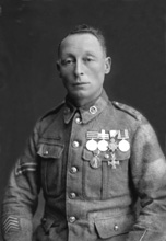 Mr McFarlane, Gamekeeper, Stronlairg, Whitebridge, Stratherrick. He wears the Queen's South Africa Medal 1899, the King's South Africa Medal 1901, the 1914-1915 Star, the British War Medal and the Victory Medal. The cross is the Imperial Russian 'Cross of St.George.'
