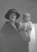 Mrs MacKinnon with baby, Braeside, North Kessock, Inverness. (Damaged plate)    