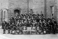 Pipes & Drum Band, Queen Victoria School, Dunblane. Possibly taken at Cameron Barracks, Inverness, circa October 1925. 