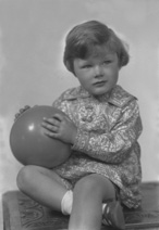 Child holding ball, of Mrs Smith, 5 Windsor Place, Dundee, September 1926.