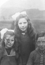 Mrs Mackay, Bunchrubin, Torness. 23.08.1926. Job request was for a print only of the girl in the middle, explaining the reason why the faces of the other two children have been blacked out.    