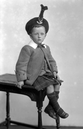 Young boy in Scottish dress.#
