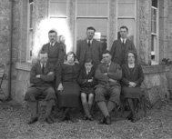 Miss MacDonald, Whitebridge. May 1928. The men have dark diamond shapes sewed onto their left sleeves. The man at the top left has been isolated to make a new solo photo. 