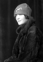 Woman portrait in hat and fur coat. #