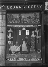 Ettles Crown Grocery, Inverness December 1927. Window display for Skippers tinned fish, an entrant in the John Bull's Great National Window Display competition. Now Chris Crook Hairdressers on the corner of Charles Street, Inverness. (2009).*