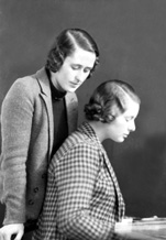 Miss Mitford. The standing woman also appears in series 30215.