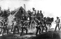 Painting of the 71st Highland Light Infantry, Heavy Marching Order, escorting prisoners - Canada, c1840. Presented by Lt.Col A.N.E Browne, late Highland Light Infantry, 1927. 