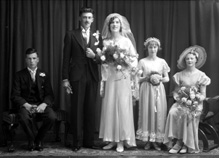 Portrait. The bridesmaid on the far right is also in images 30557a/b under the name MacKinnon. #