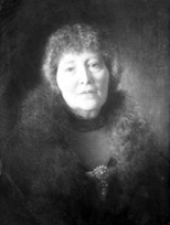 Mrs Burton Mackenzie of Kilcoy Castle, Ross-shire.  The Kilcoy estates passed through the male line of the Mackenzies of Kilcoy until the death in 1883 of Sir Evan Mackenzie, 2nd Baronet, when they were inherited by his eldest daughter, Isabella Jane. She had been born in Australia and had married Colonel John Edward Burton (1835-1901) on 30th March 1869. The castle was restored from a ruinous condition in about 1891.    