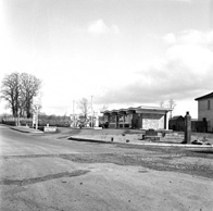 National petrol station, under the name Macbeath, C.A. Academy Street. Location is on Old Perth Road, now the Kingswell Service Station. To the right is a police phone box. *