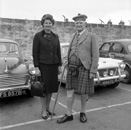 Caption states 'Betty with grandpa Matheson.' In the car park of what is now Farraline Park Bus Station, Inverness.