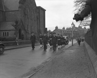 Davidson, The Sheiling, Ardrishaig, Lochgilphead, (6 Glenburn Road). Bridal. January 1953. Naval parade along Midmills Road, passing Crown Church on the left and the grounds of Inverness College on the right. Note photographer on the right hanging from the railings. 