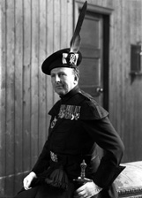 Brigadier Kenneth James Garner Garner-Smith OBE, in the dress of the Royal Company of Archers. He joined the Seaforth Highlanders in 1927 and retired as a Brigadier in 1957. He lived at Aird House, Inverness and was a Burgh Councillor for 11 years. Married Mary Jean Macdonald (1914-2013) on 4th July 1933 at St. Marks Church, London. He died in 1994. Parents of Mary-Jean, Caroline and Jamie.