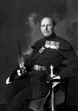 Brigadier Kenneth James Garner Garner-Smith OBE, in the dress of the Royal Company of Archers. He joined the Seaforth Highlanders in 1927 and retired as a Brigadier in 1957. He lived at Aird House, Inverness and was a Burgh Councillor for 11 years. Married Mary Jean Macdonald (1914-2013) on 4th July 1933 at St. Marks Church, London. He died in 1994. Parents of Mary-Jean, Caroline and Jamie.