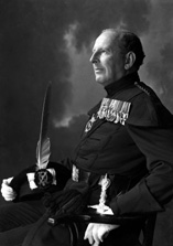 Brigadier Kenneth James Garner Garner-Smith OBE, in the dress of the Royal Company of Archers. He joined the Seaforth Highlanders in 1927 and retired as a Brigadier in 1957. He lived at Aird House, Inverness and was a Burgh Councillor for 11 years. Married Mary Jean Macdonald (1914-2013) on 4th July 1933 at St. Marks Church, London. He died in 1994. Parents of Mary-Jean, Caroline and Jamie. 