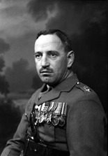 Colonel R.D Maclagan CBE, MC served in the Seaforth Highlanders from 1933 to 1960. The photograph was taken while he was commanding 11th Battalion Seaforth Highlanders TA in about 1958. On the amalgamation of the Seaforth and Cameron Highlanders in 1961 to form the Queen's Own Highlanders, he became Regimental Secretary at Cameron Barracks, Inverness until 1978. At one time was the army amateur boxing champion. 