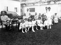 Sun Yat-sen (far left) with group of schoolgirls. Copy from December 1955. Sun Yat-sen (12.11.1866 - 12.3.1925) was a Chinese revolutionary and first president and founding father of the Republic of China (Nationalist China). As the foremost pioneer of the Republic, Sun is referred to as the 'Father of the Nation' in the Republic of China (ROC), and the 'forerunner of democratic revolution' in the People's Republic of China. Sun played an instrumental role in the overthrow of the Qing dynasty during the Xinhai Revolution. Sun was the first provisional president when the Republic of China was founded in 1912 and later co-founded the Kuomintang (KMT), serving as its first leader. Sun was a uniting figure in post-Imperial China, and remains unique among 20th-century Chinese politicians for being widely revered amongst the people from both sides of the Taiwan Strait. Although Sun is considered one of the greatest leaders of modern China, his political life was one of constant struggle and frequent exile. After the success of the revolution, he quickly fell out of power in the newly founded Republic of China, and led successive revolutionary governments as a challenge to the warlords who controlled much of the nation. Sun did not live to see his party consolidate its power over the country during the Northern Expedition. His party, which formed a fragile alliance with the Communists, split into two factions after his death.  