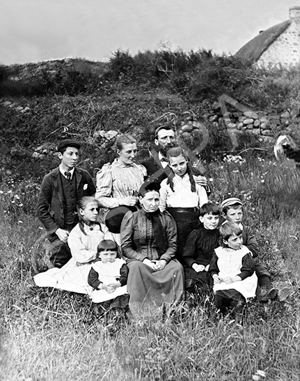 Robert Cook and family. Joseph Cook is the seated boy at the right wearing a hat.   