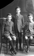 Three boys, possibly brothers c.1921, damaged plate. # 