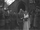 Dawn Ritchie and Norwegian Eric Prydz bridal, leaving the St. Andrew's Episcopal Church on Manse Street, Tain. They went to live in Norway. The honour guard is made up from Eric's Norwegian Army colleagues, who were stationed in Tain at the time.