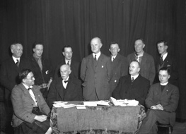 Meeting ceremony. Man seated at left appears in image H-0079. #