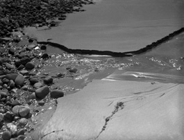 Running water through sand.*