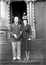 Uniformed couple on the steps of Inverness Cathedral. # 