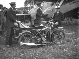 Mail being delivered to a Highland Airways aeroplane. Highland Airways began a passenger service between Inverness, Wick and Kirkwall on 8th May 1933. *