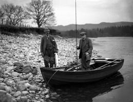 Salmon fishermen on Highlands river. #