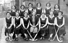 Hockey 1st XI 1949-1950. Rear: Peggy Montgomery, Jean Douglas, Isobyl Bauchop, Isobel Broman, Helen Ford, Alice MacLeod. Front: Sandra Oliver, Aileen Munro, Peggy MacLeod, Miss Maude Yule, Deirdre Munro, Vaila MacLeod, Margaret Oliver. (Courtesy Inverness Royal Academy Archive IRAA_059).
