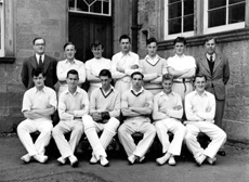 Inverness Royal Academy Cricket 1st XI 1949-1950. Rear: Mr McArdle, Ross Martin, Scott Moffatt, Niven Grant, George Grant, Will Cameron, Mr MacLeay. Front: John Sanderson, Alfred Cooper, Donald MacLennan, Brian MacDonald (C), Ian Rodger, Leslie Hodge. (Courtesy Inverness Royal Academy Archive IRAA_064).