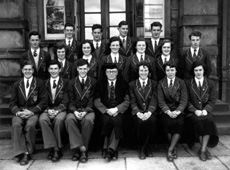 Inverness Royal Academy Prefects 1953-1954. Rear: A. MacLeod, D. Dewar, William Ford, I. Philip. Middle: A. Griffiths, K. Kane, M. Eunson,  V. Beveridge, S. Martin, M. MacRae, A. Grant. Front: D. Robin, S. Sanderson, A. MacDiarmid, Rector D.J MacDonald, A. Sinclair, S. Love,  J. Fraser. (Courtesy Inverness Royal Academy Archive IRAA_085).