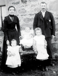 Margaret and Donald MacGregor of Conrock Farm, Rothes c1905-1906. (Her maiden name was Margaret Anne Dingwall.) Children from left to right are Christina, Colin and Margaret. Submitted by Frank McGregor.