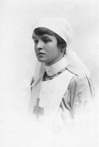 Mary Millicent (May) Fraser, in Red Cross uniform. She worked in a convalescent hospital for wounded soldiers at Hedgefield, Inverness, c1917-1918. Submitted by Heather Watts. Fraser-Watts Collection.