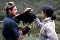 Peter Combe with Wendy Stewart and Murdoch the golden eagle in Strathconon. (Courtesy James S Nairn Colour Collection). ~  