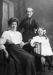 Andrew Paterson portrait of Agnes MacLennan (standing) with daughter Georgina Smith and grand-daughter Ruth. Georgina married Alexander Smith of Elgin who operated a drapery business in Queensgate, Inverness, in 1902. Submitted by Susan Edgar Mutch. (AP/H-0292) 