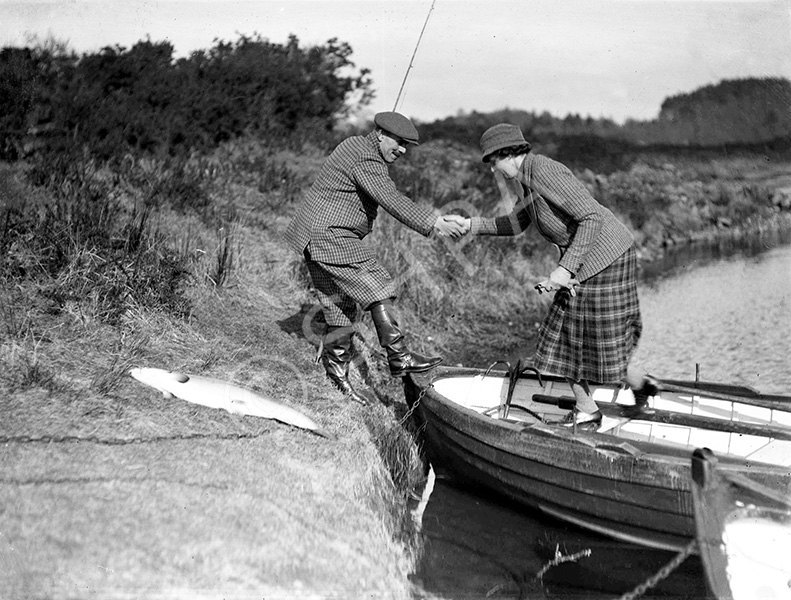 Unidentified celebrity people salmon fishing at Dochgarroch. *