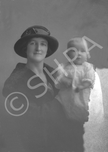 Mrs MacKinnon with baby, Braeside, North Kessock, Inverness. (Damaged plate)    