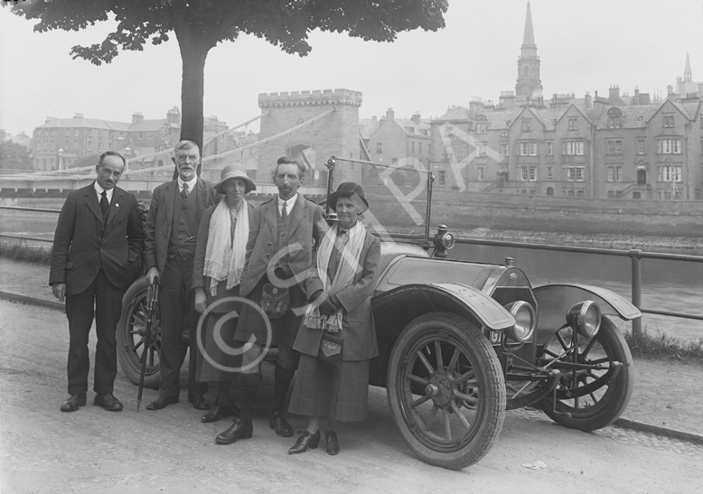 Scottish Home Rule Group outside the Palace Hotel, standing beside vintage car with Ness Bridge and the old Caledonian Hotel (demolished 1960s) in the background. Badge on front of the vehicle, RMC, possibly stands for Renault Motor Company. (Scot Auto Ass. Glasgow written on envelope?)*