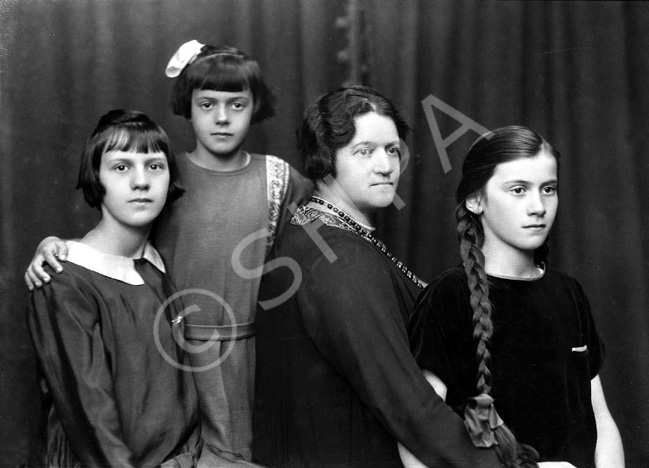 Woman, with daughters, September 1925. # 