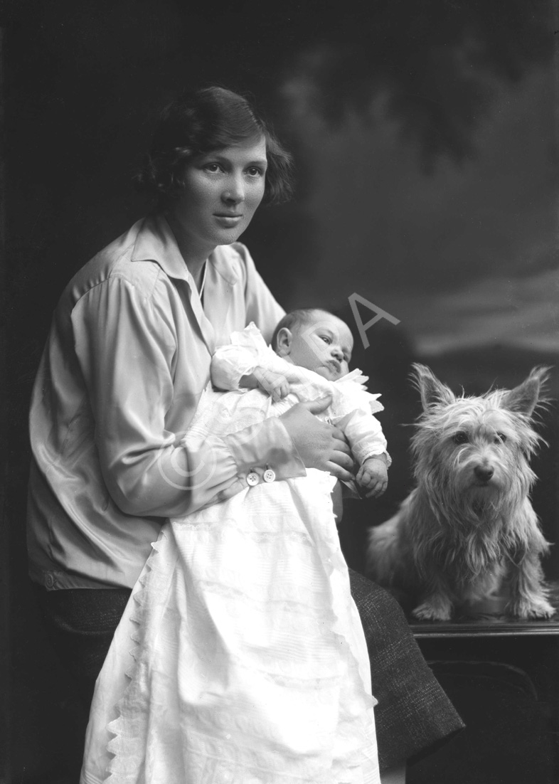 Woman with baby and pet dog, June 1926.# 