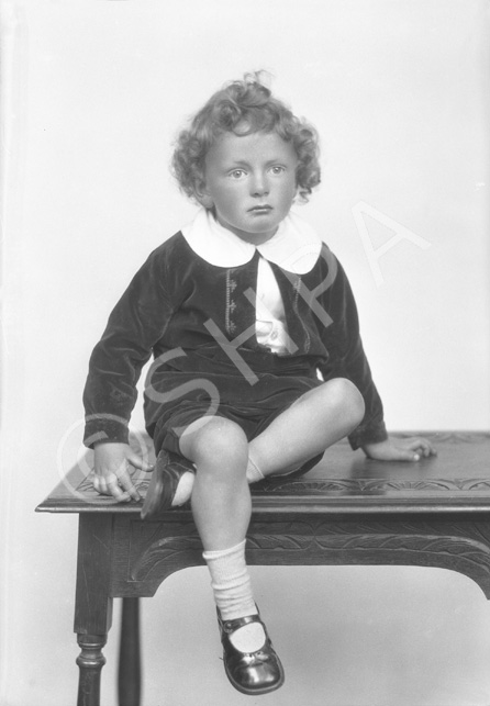 Grant, young boy on table.