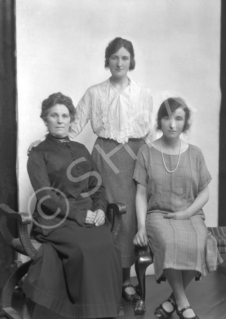 MacLean. Possibly mother and daughters.