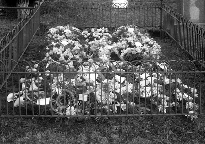 Unidentified cemetery. Floral tributes. *