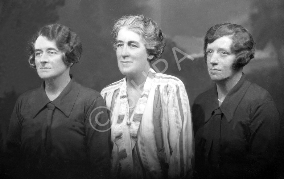 Mrs A MacGregor (centre) and two others. Damaged plate.