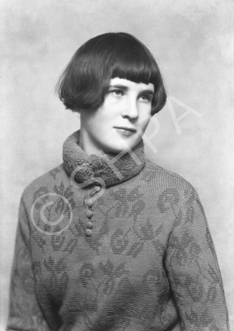 Woman in jumper portrait.#