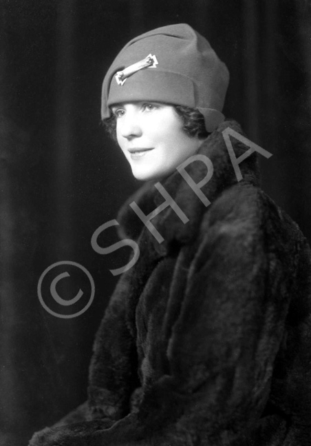 Woman portrait in hat and fur coat. #