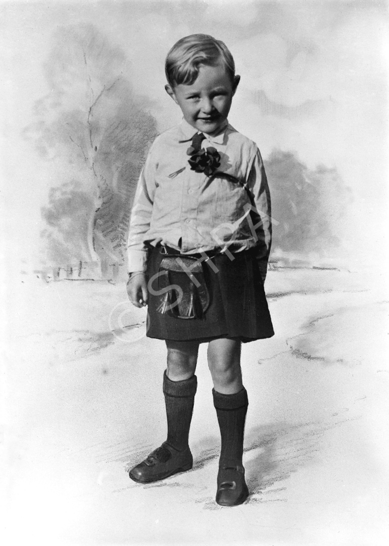 Boy in kilt with hand-drawn background.#