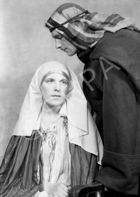 Theatrical actors dressed in costume. Possibly for a Nativity play. #